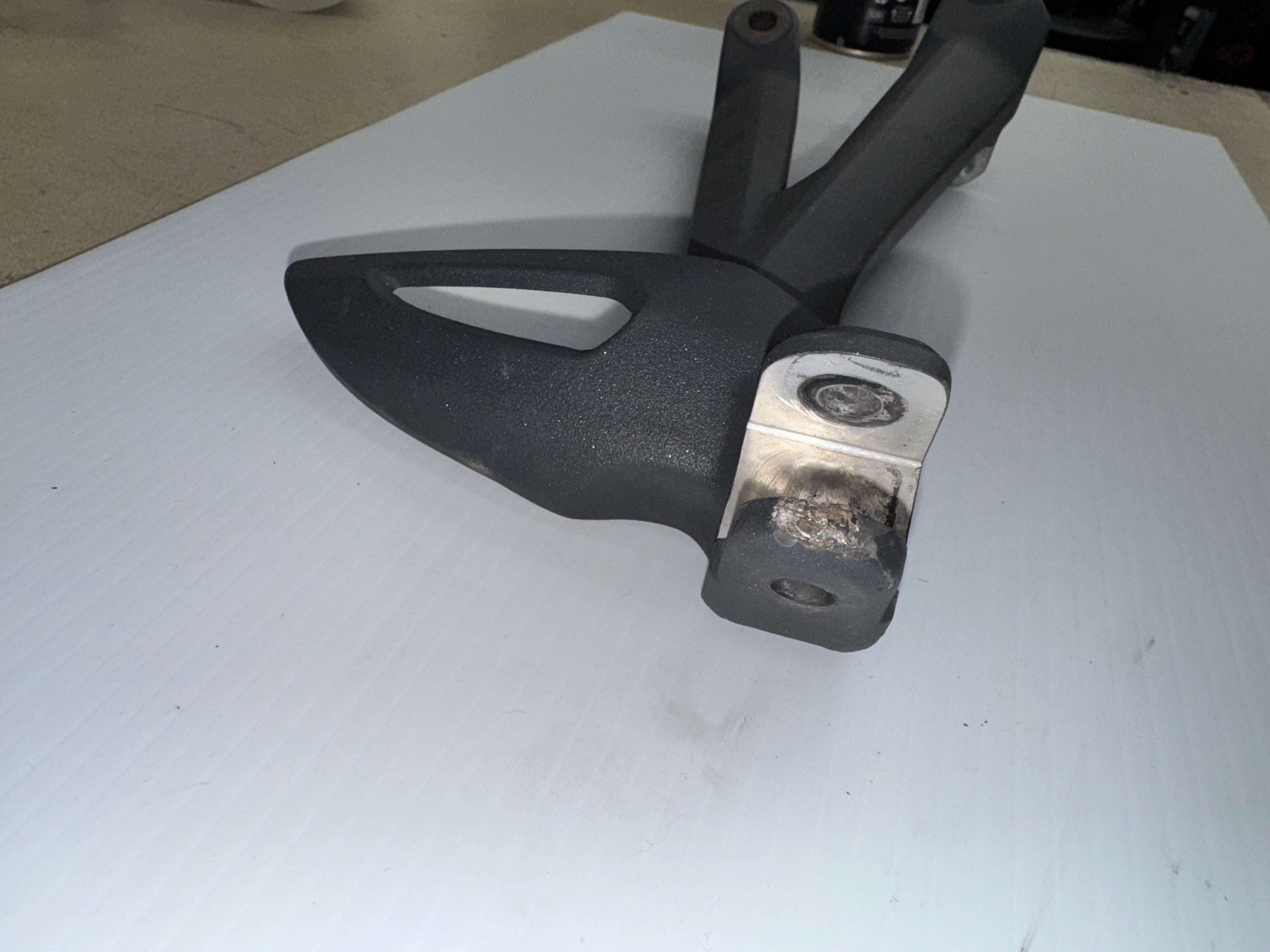 USED RH Rear Footrest Hanger - T2081942